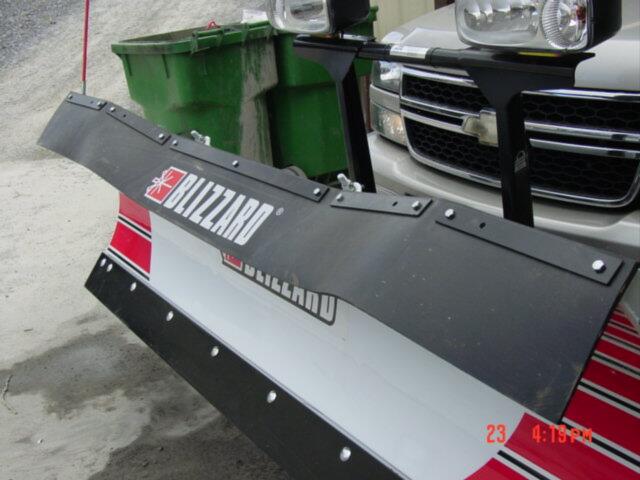rubber deflector for a blizzard plow